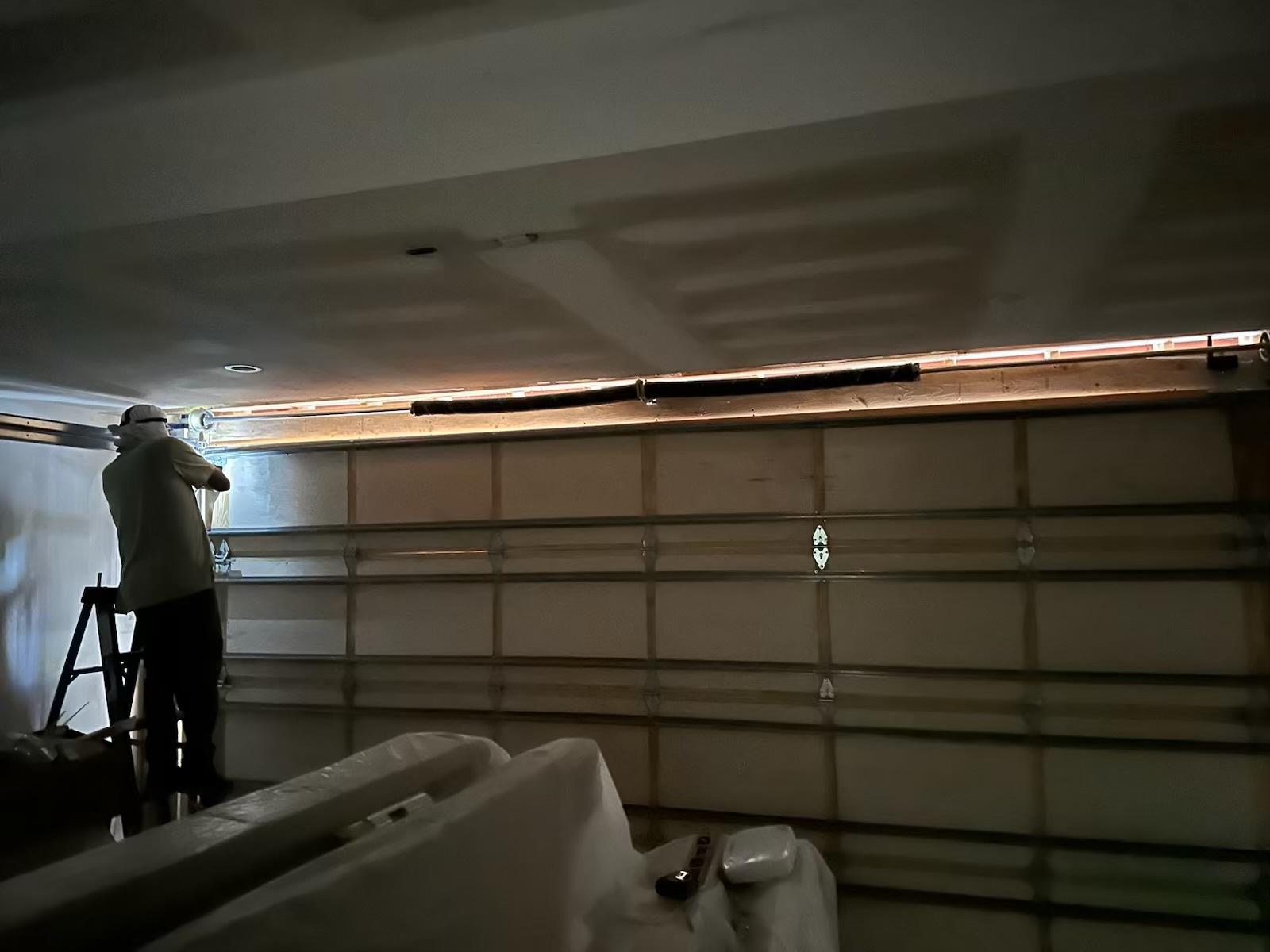 Garage door spring repair in Houston TX by Lemus Garage Door Services